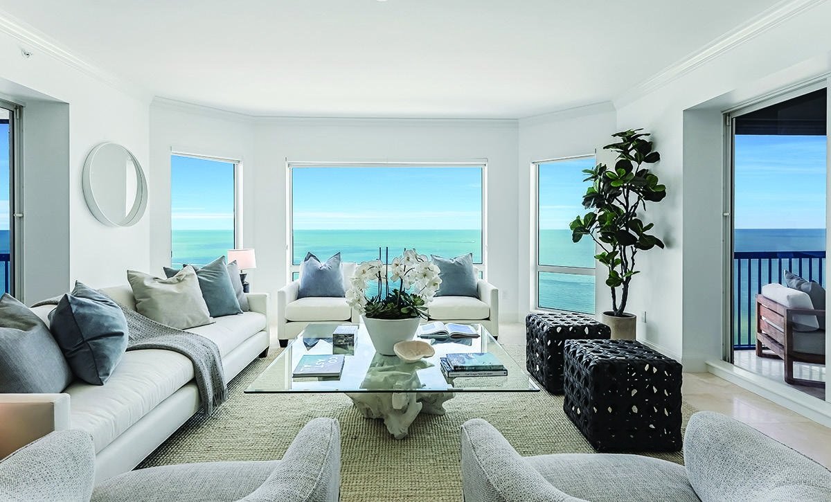 Light filled coastal living room with views of the Gulf
